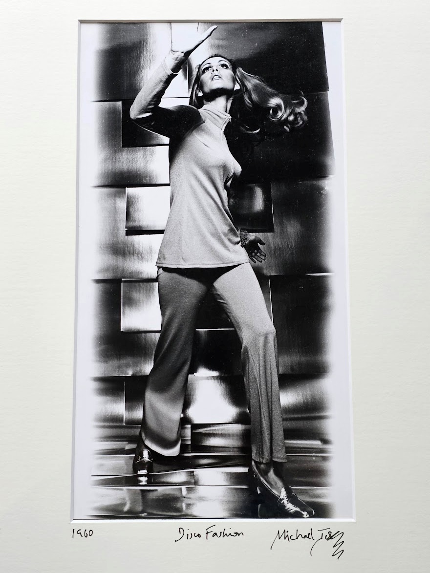 Groovy futuristic sixties swinger dancing, disco babe on the dance-floor by Michael Joseph