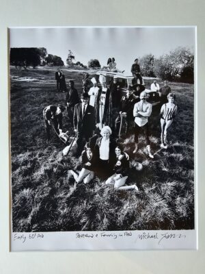 Reverend and family in field, a group of people in fancy dress in the middle of the countryside by Michael Joseph