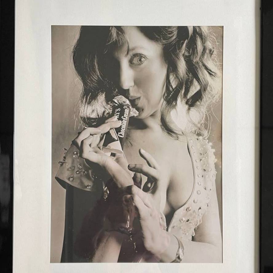 Happy lady enjoying her bar of chocolate by Michael P Joseph – Image 2