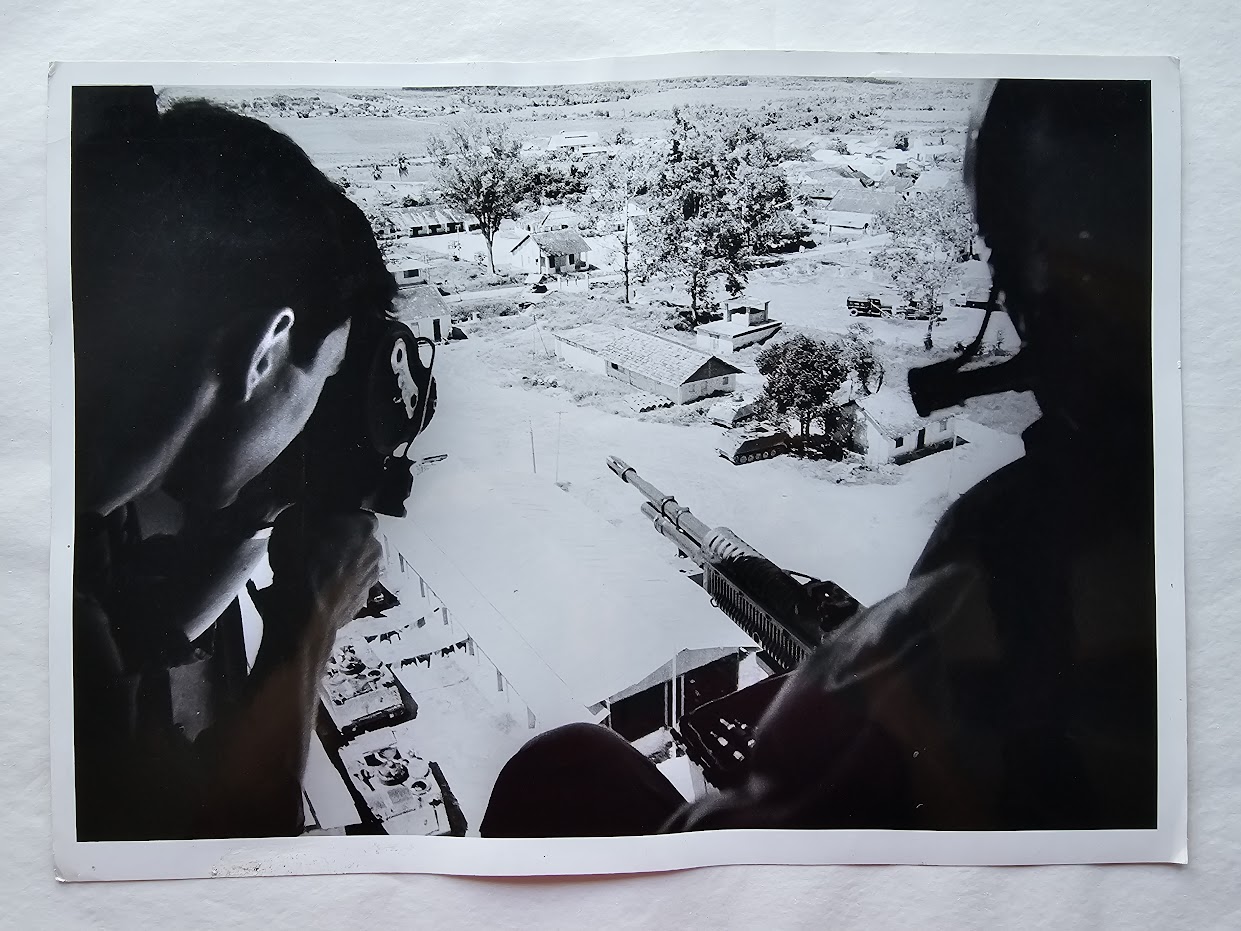 Saigon helicopter war photography with Keith Kay and machine gun by Michael Joseph