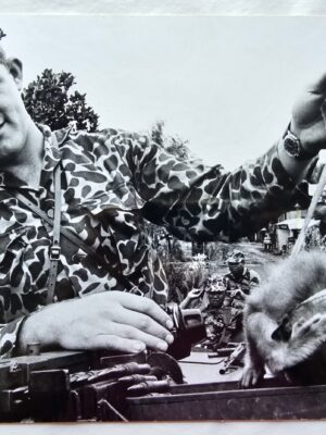 Soldier and animal on lead in Saigon, taken during Vietnam war, 1965 authentic darkroom print by Michael Joseph