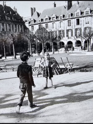 Boy approaching girl at place vendome, Paris, carefree sixties by Michael Joseph