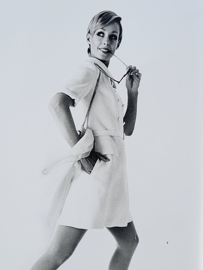 Pretty blonde model holding her glasses with her teeth, say oh really - only by Michael Joseph – Image 3