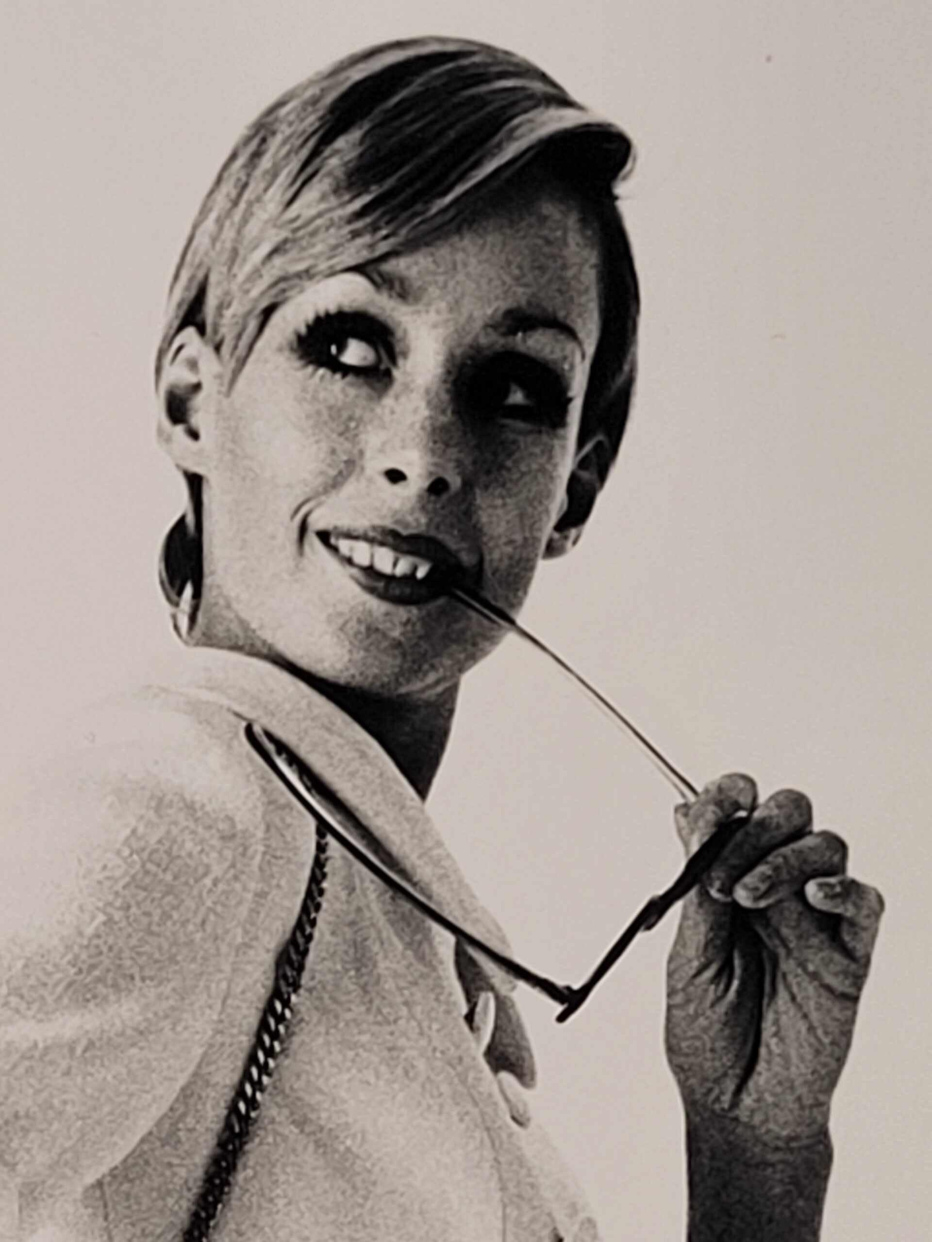 Pretty blonde model holding her glasses with her teeth, say oh really - only by Michael Joseph – Image 9