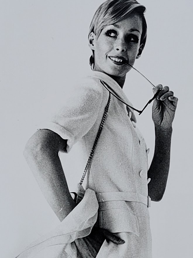 Pretty blonde model holding her glasses with her teeth, say oh really - only by Michael Joseph – Image 5