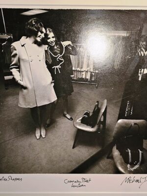 Pair of sixties shoppers in a shop in Carnaby Street, a test print by Michael Joseph