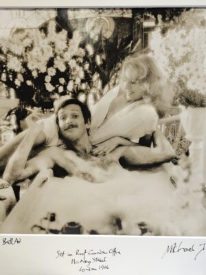 German bubble bath advert - man with moustache smoking in his bath with blonde behind by Michael Joseph