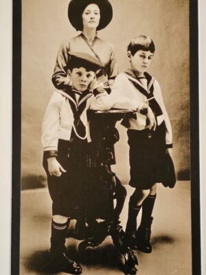 Pair of boys dressed as sailors with their mother, sepia tone by Michael Joseph