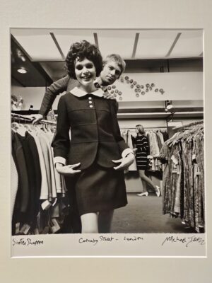 Pair of shoppers in a Carnaby Street clothes store, test print by Michael Joseph
