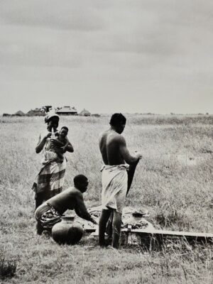 African family working in a field, authentic darkroom print by Michael Joseph