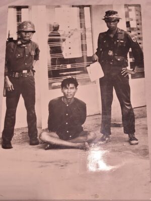 South Vietnam, soldiers with prisoner, poignant photograph taken in 1964 by Michael Joseph