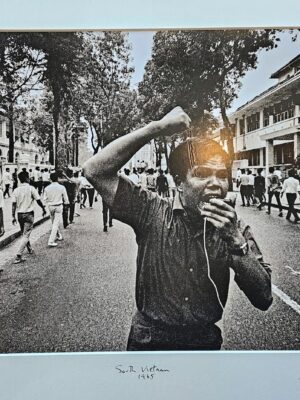 Saigon student protesting in the street during the Vietnam War by Michael Joseph