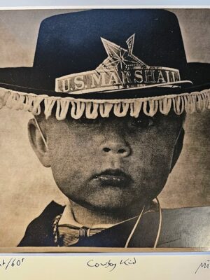 Cowboy kid - portrait of a young boy wearing a cowboy hat, test print by Michael Joseph
