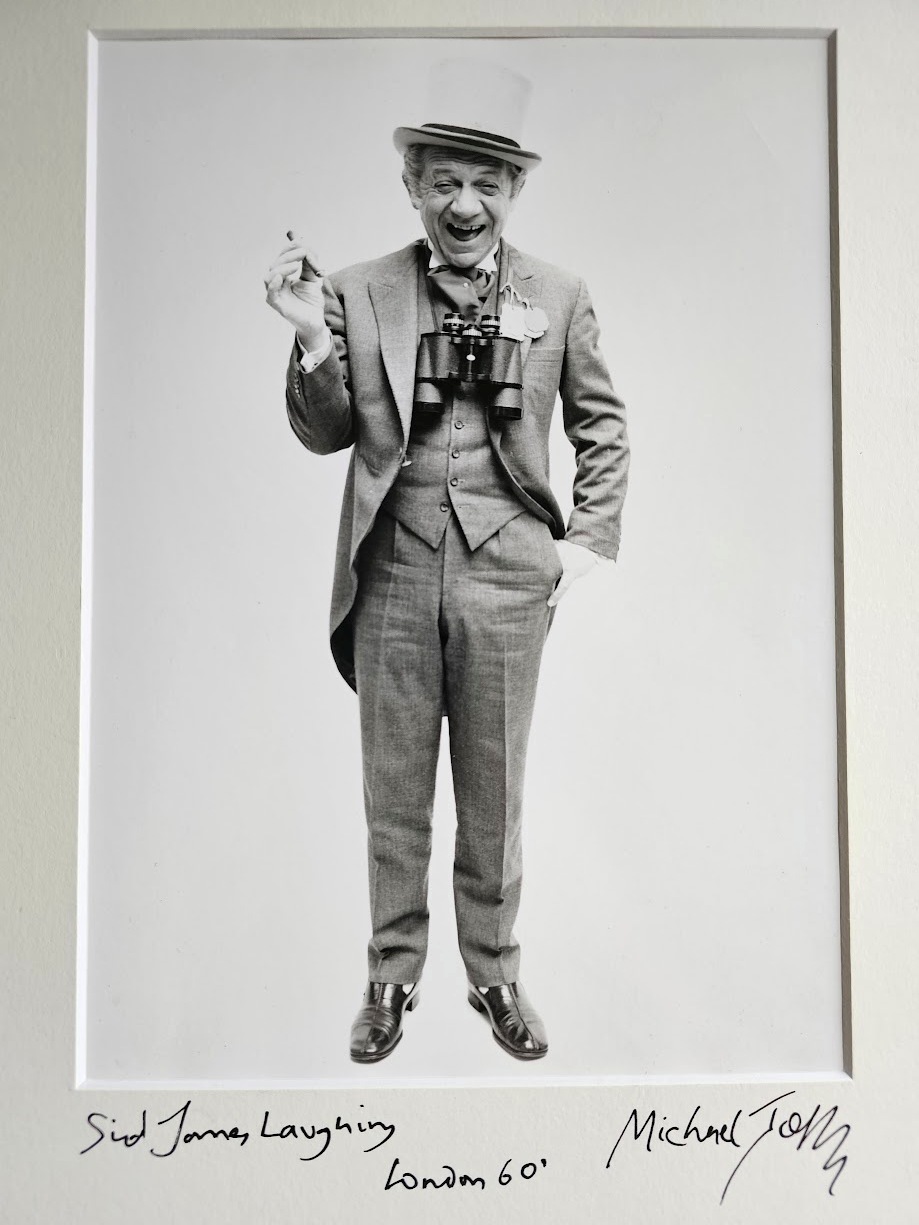 Sid James holding a cigar - laughing out loud, full body portrait Authentic Darkroom Photo by Michael Joseph