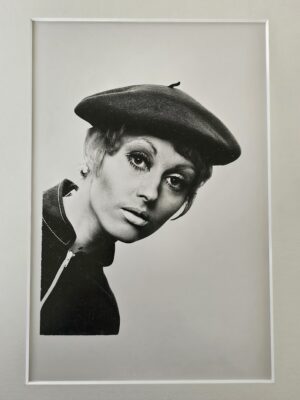 Portrait of a pretty model with short hair mascara and a beret by Michael Joseph