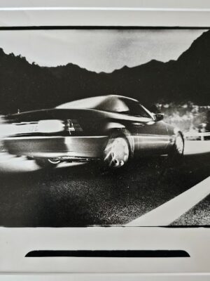 Car in movement speeding at the bend, near Cadaques during pirelli shoot by Michael Joseph