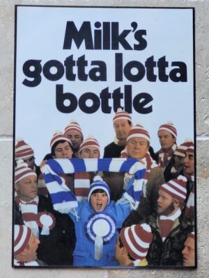 Milk's Gotta Lotta Bottle Laminated advert (by Michael Joseph)