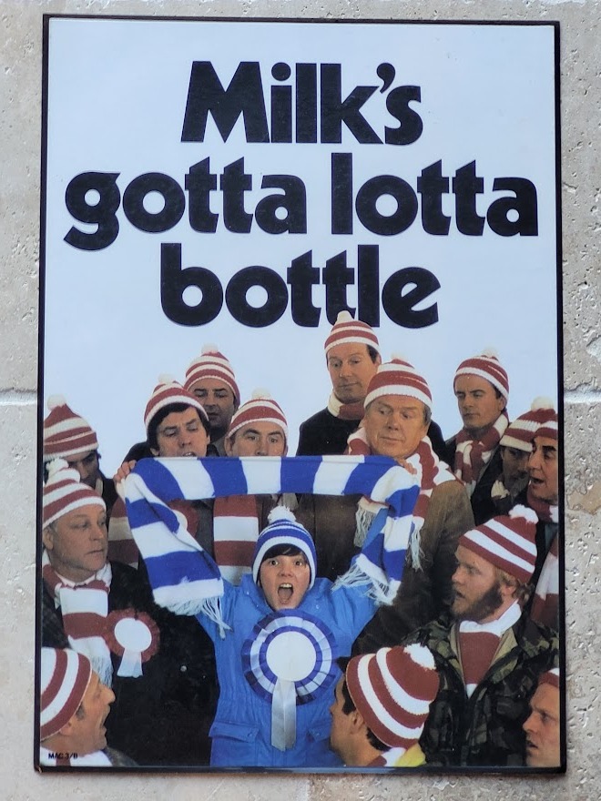 Milk's Gotta Lotta Bottle Laminated advert (by Michael Joseph)