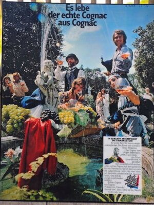 Fountain, grapes and happy people drinking Cognac - "Long live the real Cognac from Cognac" ad by Michael Joseph