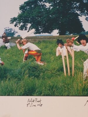 Rolling Stones playing cricket at Swarkestone, June 1968, a sporty Mick Jagger and colleagues in the grass by Michael Joseph