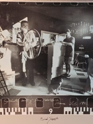 Cyclist's café with negative border, blue bromide authentic darkroom print by Michael Joseph