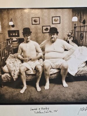 Laurel and Hardy lookalikes on bed, authentic darkroom test print for Tubstem sock advert, by Michael Joseph