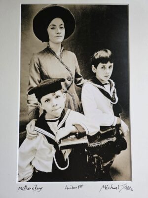 Sailor boys with their mother, sepia tone by Michael Joseph
