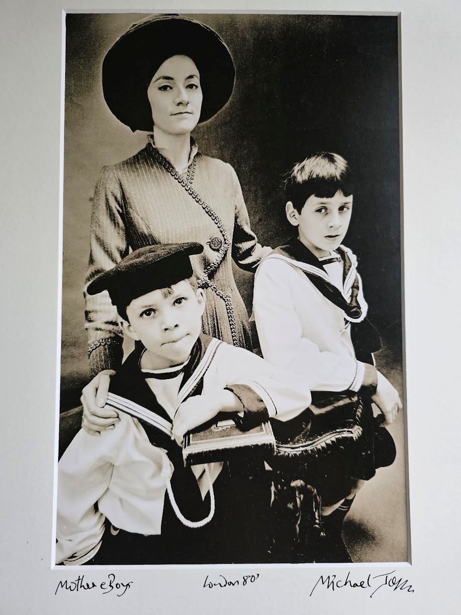 Sailor boys with their mother, sepia tone by Michael Joseph