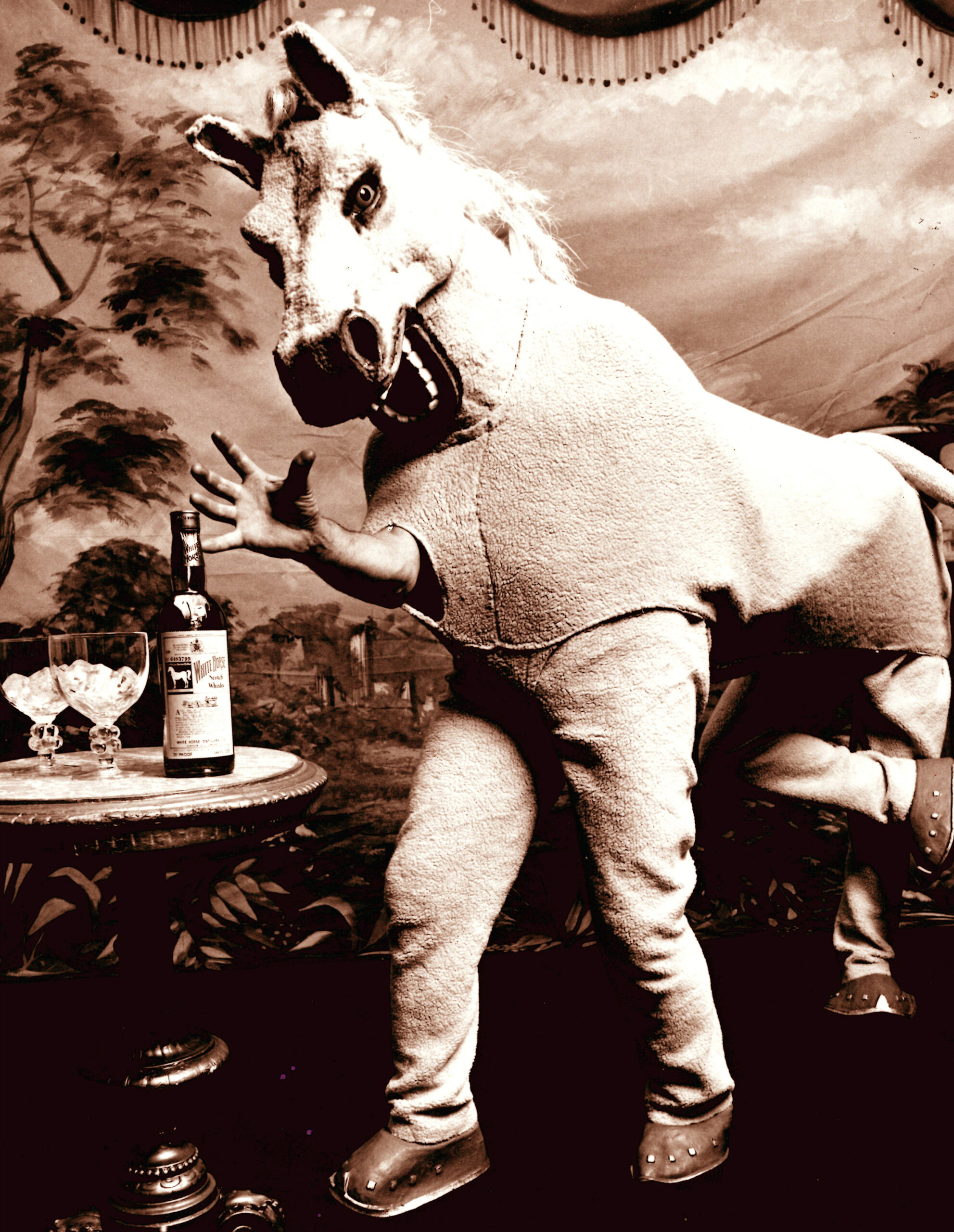 Magnet Pantomime Horse ad for White Horse Whisky, Aimant publicitaire photo par Michael Joseph